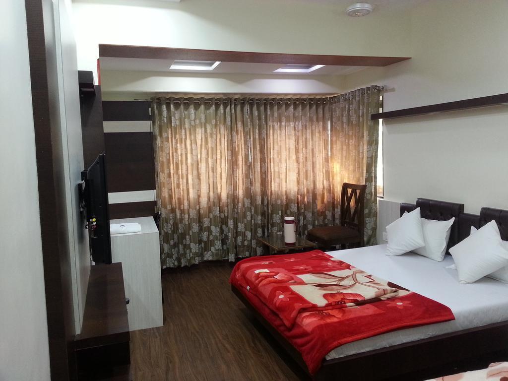 Hotel Oasis Mumbai Cameră foto