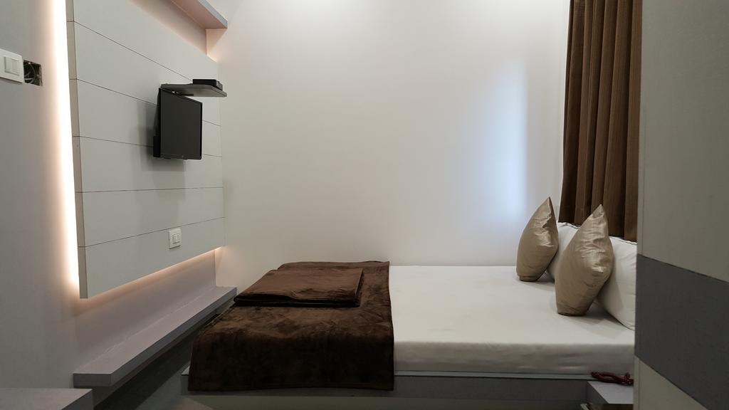Hotel Oasis Mumbai Cameră foto